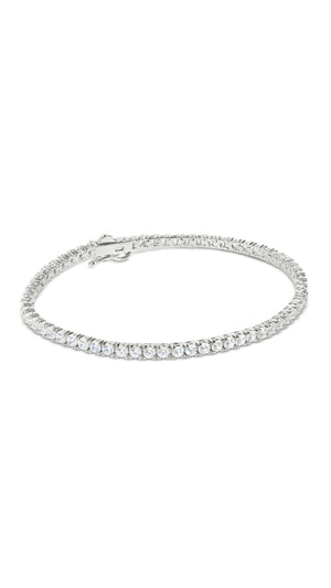 Simple line classic tennis bracelet featuring round brilliant stones, exquisitely cut and polished to give the ultimate sparkle.